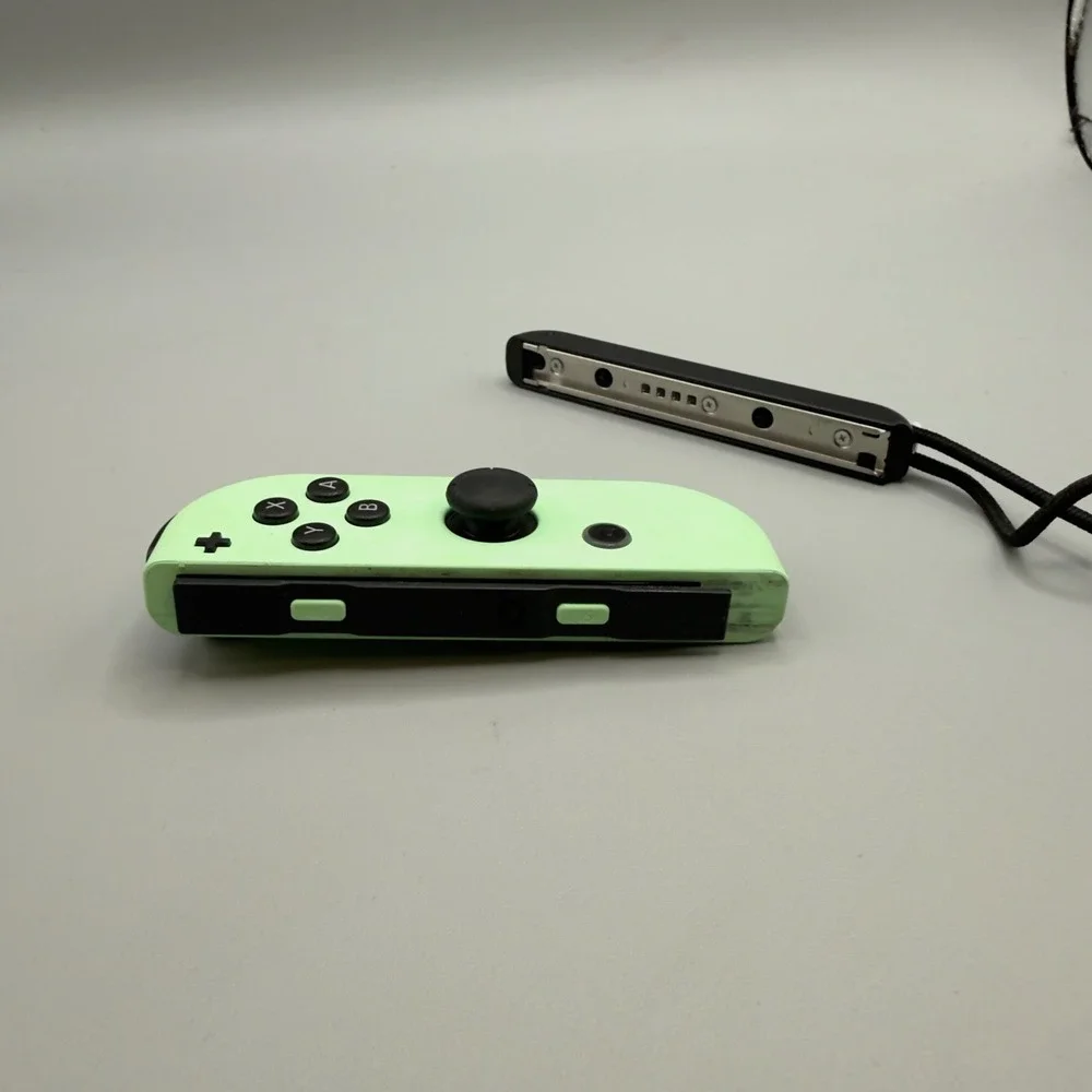 Nintendo Switch Joy-Con Right Controller Pastel Green with Wrist Strap